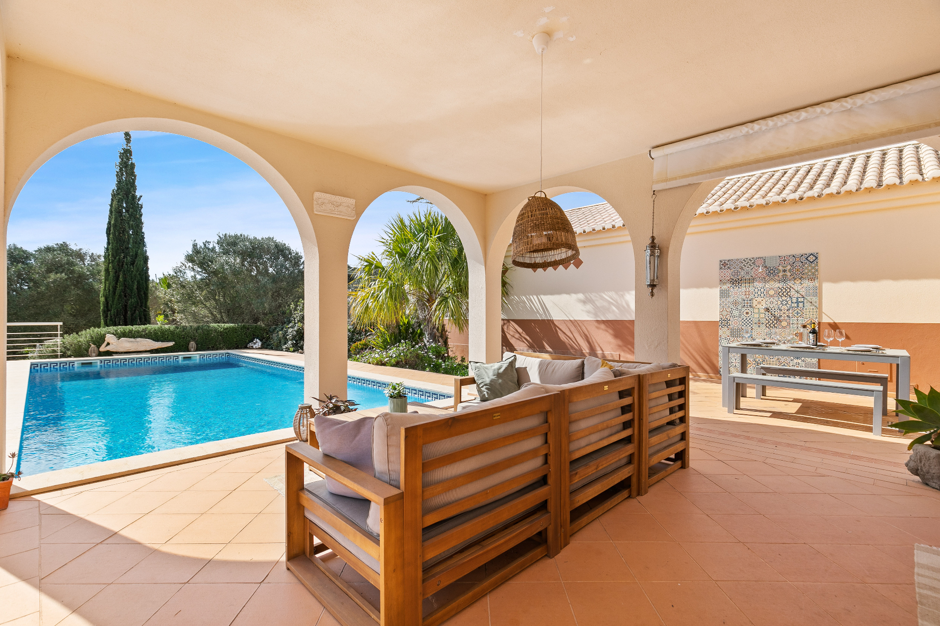 Sun terrace with countryside views at a luxury holiday villa near Burgau, Algarve